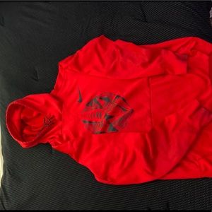 Red Nike hoodie with football design